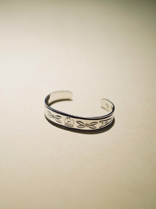  LARRY SMITH - THUNDERBIRD STAMP BRACELET